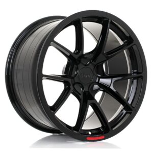 Black glossy multi-spoke car wheel/rim with a five-spoke design and a red accent at the edge.