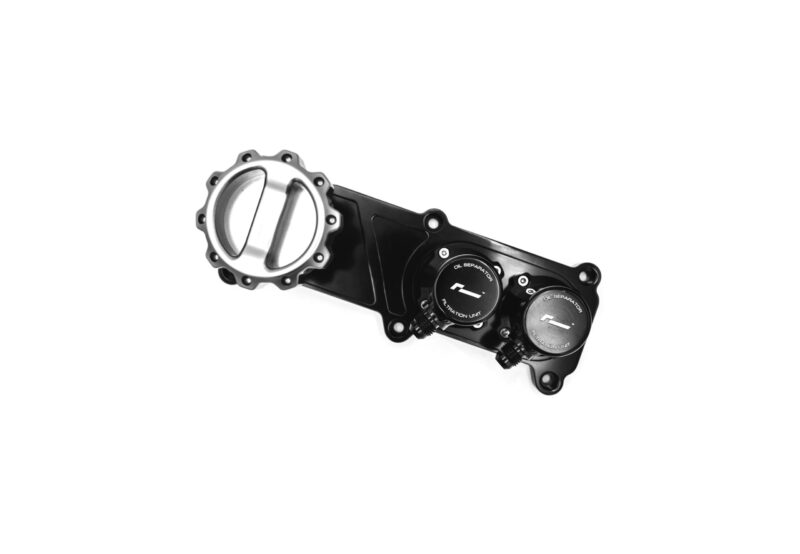 Partial view of a black motorcycle engine component with round oil separator caps and bolts.