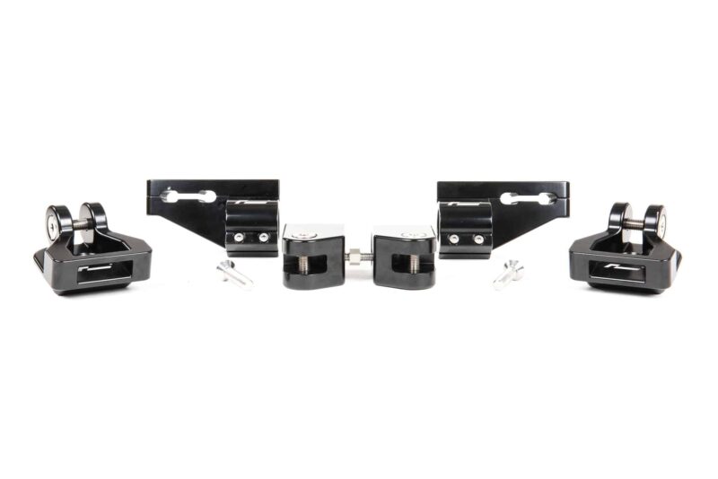 45820470472_c1440291d4_k-1jpg - OPSHOLDERS Black metal clamp fixtures with screws arranged on a white background, showing a mirrored layout on both sides.