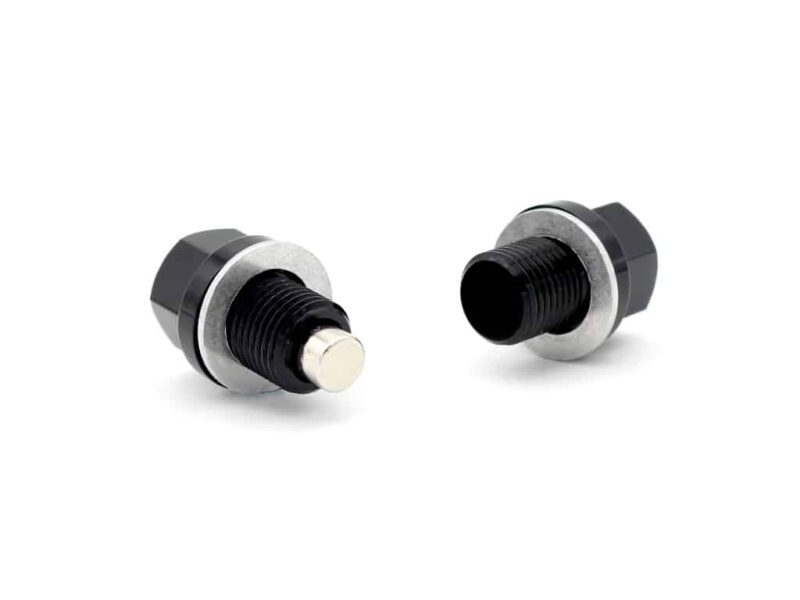 Two metal threaded fittings with hex nut flanges on a white background.