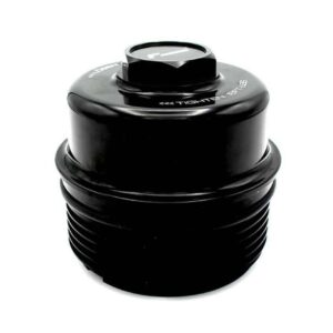 Close-up of a black cylindrical camera lens accessory with a ridged, threaded base and a top dial.
