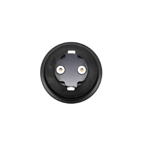 Close-up of a round black electrical receptacle with two gold-colored contacts inside a circular housing.
