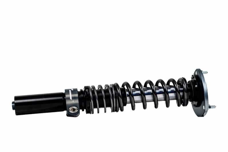 52424668556_410588167c_c-1jpg - OPSHOLDERS Automotive coilover shock absorber with a black coil spring and mounting plates on both ends, isolated on white background