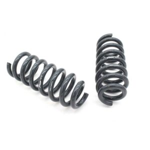 53272464673_52be6e73fd_k-1jpg - OPSHOLDERS Two black metal coil springs on a white background, one horizontal and one vertical, likely vehicle suspension springs.