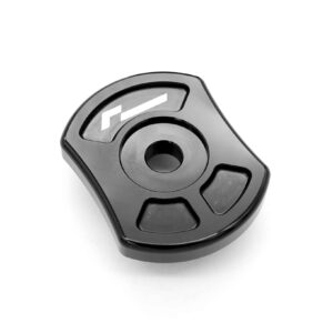 Close-up of a black ergonomic device with a central round knob and surrounding buttons, logo visible.]