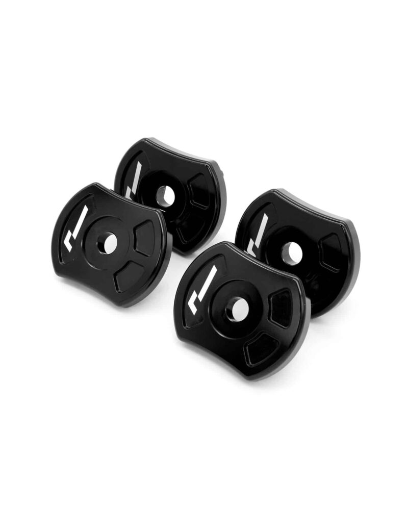 Set of black barbell weight plates with white numbers, arranged on a white background
