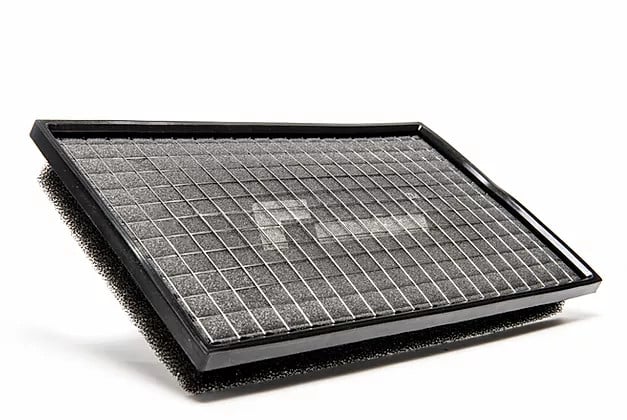 677af8_4f15ec98b2284084ab53a7b82f610dc6_mv2_d_7360_4912_s_4_2-1jpg - OPSHOLDERS Rectangular air filter with a black frame and grid-pattern filter media.