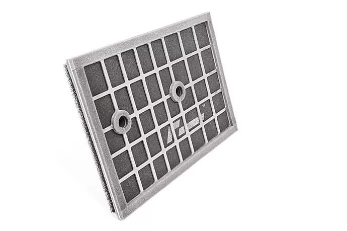 677af8_5eea8ac7e3da4b0abd9a0956c00c81db_mv2_d_6875_4588_s_4_2-1jpg - OPSHOLDERS Rectangular metal air filter with a grid pattern and two circular mounting holes