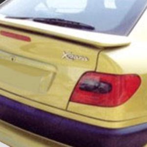 Rear view of a yellow hatchback car with a spoiler, red taillights, and an Xsara badge; license plate blurred.