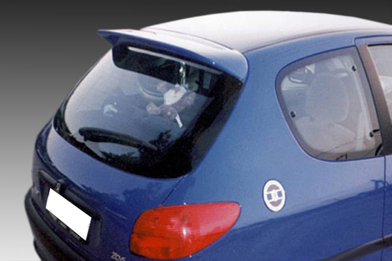 A-154_1jpg - OPSHOLDERS Blue hatchback car seen from rear-left angle, with red taillight and obscured white license plate area