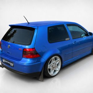 A-201_2jpg - OPSHOLDERS Blue modified hatchback viewed from the rear-left, featuring aftermarket wheels and a rear spoiler/roof antenna.