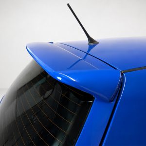 A-201_3jpg - OPSHOLDERS Blue hatchback roof with a spoiler and antenna, shown from above.