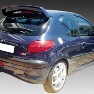 Rear-right view of a blue hatchback car with a spoiler, alloy wheels, and visible exhaust tip viewed on a gradient background, likely a modified small car.