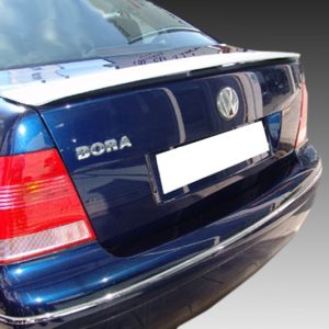 Rear view of a blue Volkswagen Bora with red tail lights and a blurred white license plate area on the trunklid
