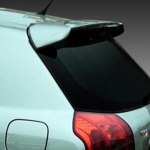 A-219_2jpg - OPSHOLDERS Rear view of a light-blue hatchback with a spoiler and tinted rear window, showing the left taillight and fuel door.