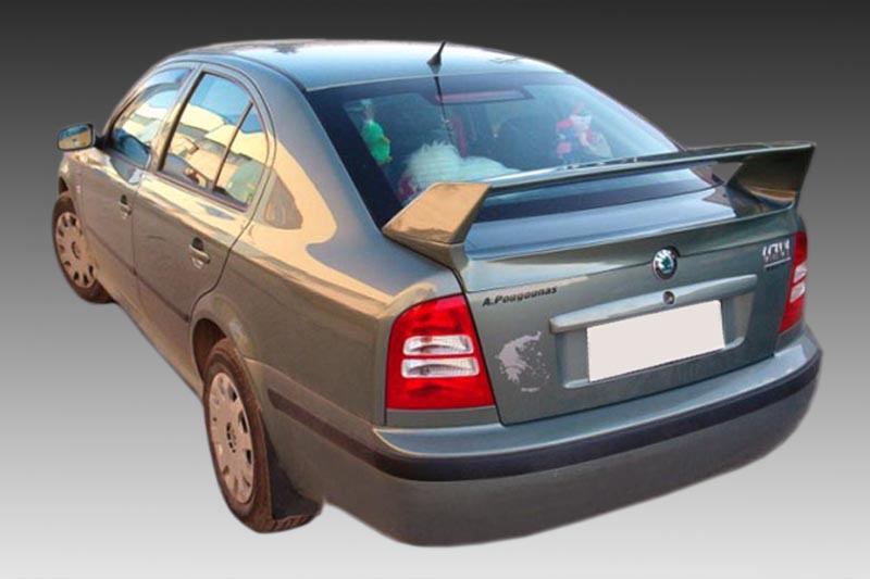 A-239_1jpg - OPSHOLDERS Grey sedan viewed from the rear-left with a large rear spoiler on a gradient backdrop.