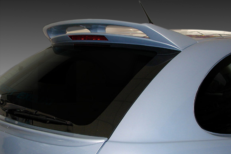 A-242_1jpg - OPSHOLDERS Rear of a silver hatchback showing a curved roof spoiler and tinted rear window glass.