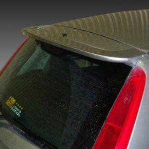 Rear view of a gray hatchback with a large black spoiler mounted at the top of the rear window edge.