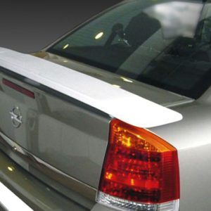 Silver sedan rear view featuring a white aftermarket spoiler on the trunk lid. Opel badge visible on the trunk.