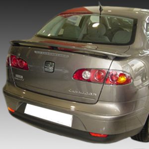 Rear view of a metallic gray SEAT car showing taillights, trunk lid, and spoiler against a gradient background.