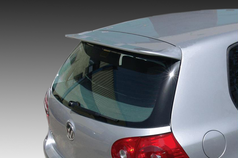 A-271_2jpg - OPSHOLDERS Silver Volkswagen hatchback rear view with spoiler and rear window wiper visible in a close-up shot.