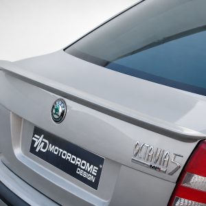 Rear view of a silver Skoda Octavia A5 hatchback with a spoiler, showing the Skoda badge and tail lights