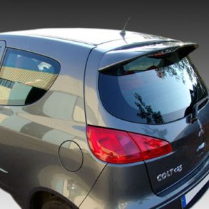Rear-right view of a silver Mitsubishi Colt hatchback, showing the taillights and rear window.”