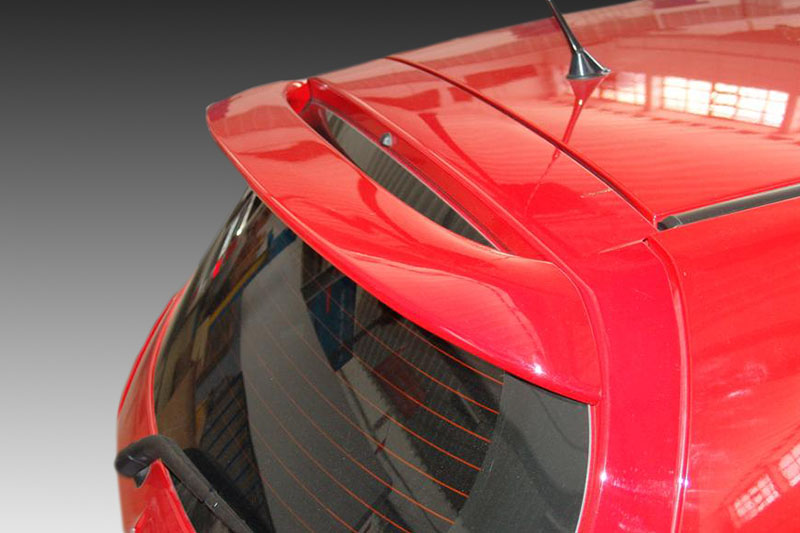 A-287_2jpg - OPSHOLDERS Red hatchback rear view featuring a prominent spoiler and rear windshield wiper