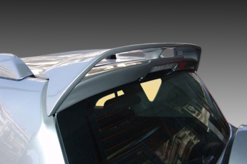 A-295_1jpg - OPSHOLDERS Rear spoiler mounted on the tailgate of a silver hatchback car with a curved wing design.