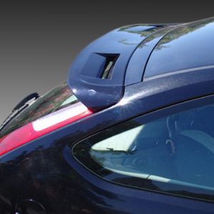 Close-up of the rear section of a blue car, showing the spoiler and curved rear window at an angle.