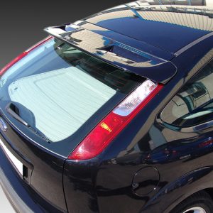 A-296_2jpg - OPSHOLDERS Top-down rear view of a dark blue hatchback car with a rear spoiler and visible taillights on a glossy surface.