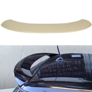 Beige curved strip on a white background above a partial image of a shiny black car with reflections.