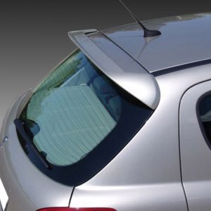Silver hatchback viewed from the rear-left, showing the rear window, wiper, and spoiler edge.