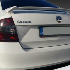 Rear view of a white Skoda Octavia, showing the trunk badges, tail light, and a European license plate.