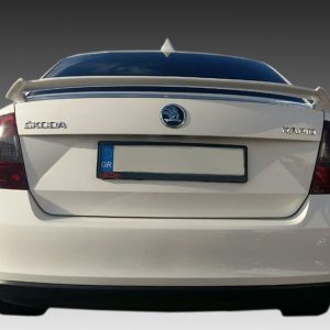 A-310_2-1jpg - OPSHOLDERS Rear view of a white Škoda Rapid sedan with a Greek license plate (GR) and a spoiler on the trunk lid
