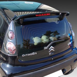 Rear view of a dark blue Citroën hatchback, showing the back window with defroster lines, tail lights, and the Citroën logo.