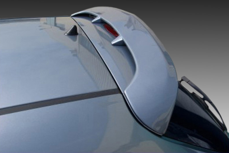 A-314_2jpg - OPSHOLDERS Close-up of a blue car's rear spoiler with fins, showing a glossy finish and curved design.