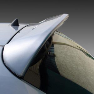 A-314_3jpg - OPSHOLDERS Close-up of a car's rear spoiler mounted above the trunk with the curved rear window below