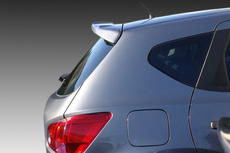 A-315_1jpg - OPSHOLDERS Blue hatchback/suv rear quarter panel with taillight, rear window, and small spoiler visible from the left side