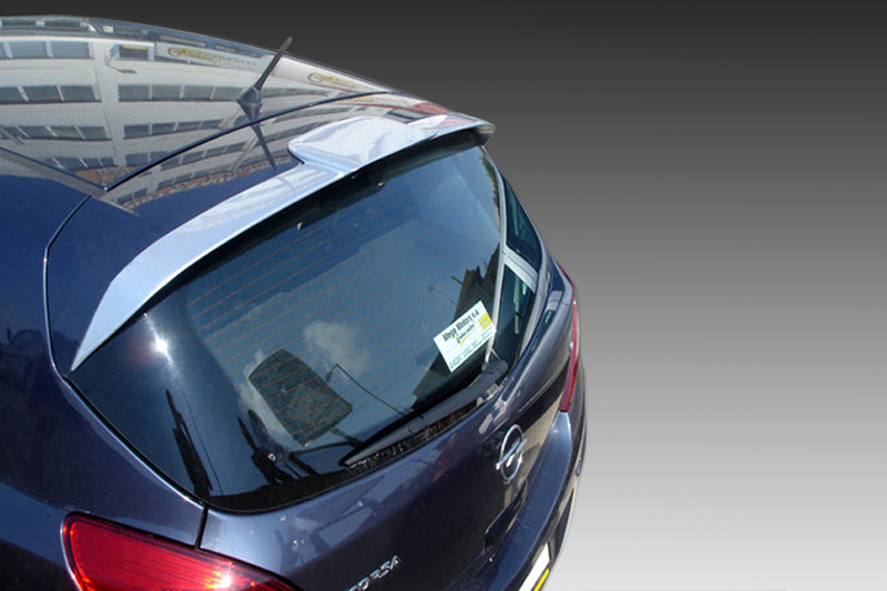 A-317_1jpg - OPSHOLDERS Blue hatchback viewed from above, showing the rear window with a small sticker and a subtle spoiler edge in urban reflections.