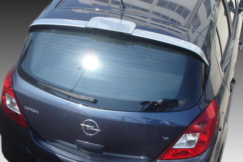 A-317_2jpg - OPSHOLDERS Rear view of a blue Opel Corsa hatchback photographed from above, showing the Opel emblem and rear window wiper.