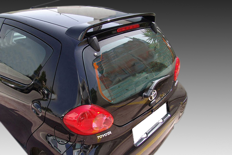 A-321_1jpg - OPSHOLDERS Rear view of a black Toyota hatchback showing red circular taillights, Toyota badge, and rear window with wiper.
