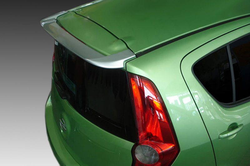 A-337_1jpg - OPSHOLDERS Rear view of a lime-green hatchback with a dark rear window and prominent red taillight