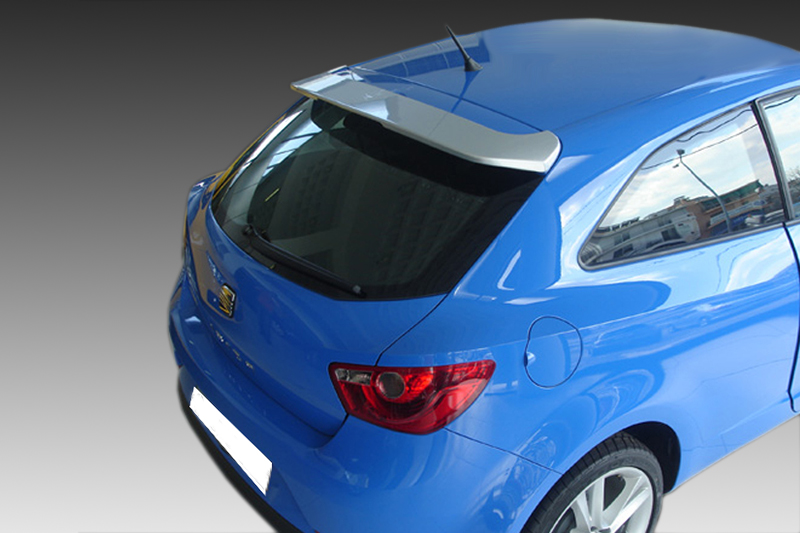 A-339_1jpg - OPSHOLDERS Blue hatchback viewed from rear-right corner, showing spoiler, red tail light, and glossy finish