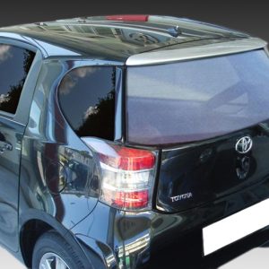 Rear view of a black Toyota hatchback from the left, showing taillights, rear window, and Toyota badge