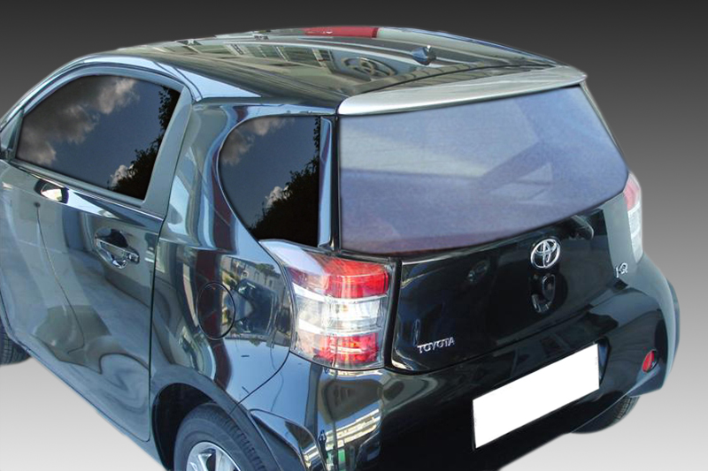 A-349_1jpg - OPSHOLDERS Rear view of a black Toyota hatchback from the left, showing taillights, rear window, and Toyota badge