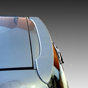 Close-up of a car's curved windshield and wiper against a gradient sky.