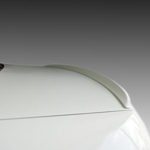 White car rear spoiler mounted on the trunk, shown against a gray gradient background.