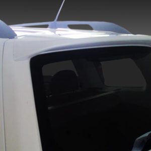 Rear-quarter view of a white SUV showing the tinted rear window and roof rails.