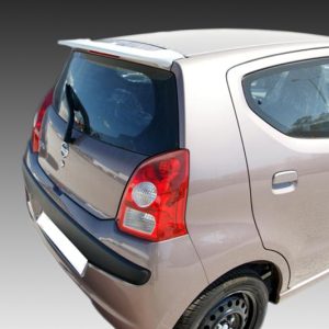 Rear three-quarter view of a beige hatchback parked, showing the back window wiper and red taillights